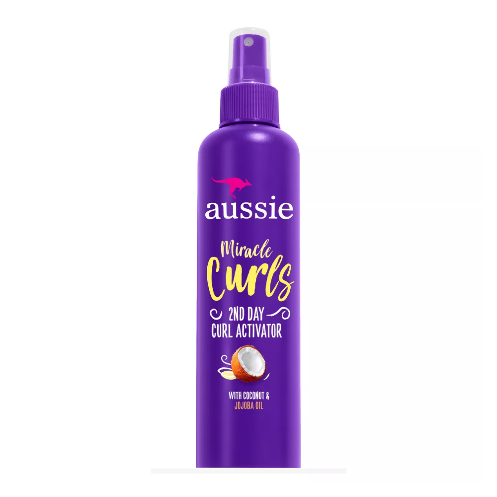 87928610_1730624484_160ec774c96a1c71ca75bb9837ce8c7c اوسي منشط ميراكل لتموجات الشعر الكيرلي لليوم الثاني بزيت جوز الهند والجوجوبا - 251 مل - الصورة 1